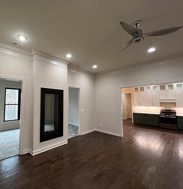 elegant modern home hallway  with wood floor and tall ceilings